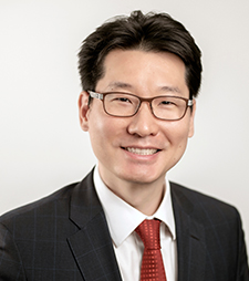 Dr John H Chang  
